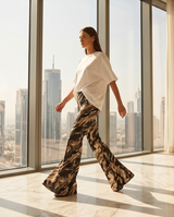 Pantalon flare à motifs marbrés noir et beige