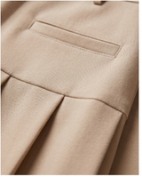 Mini jupe plissée beige