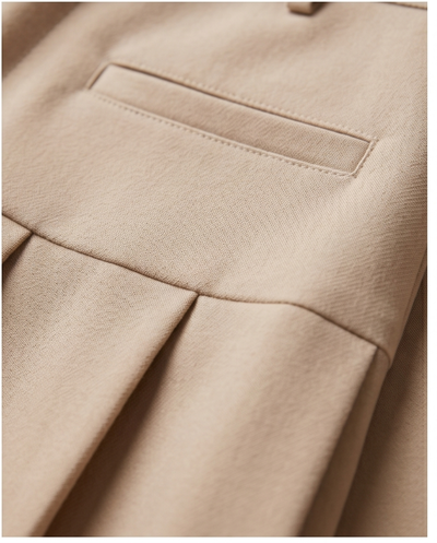 Mini jupe plissée beige