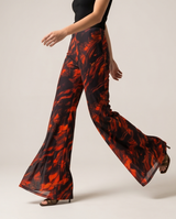Pantalon flare à motifs marbrés orange et noir