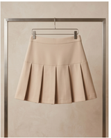 Mini jupe plissée beige