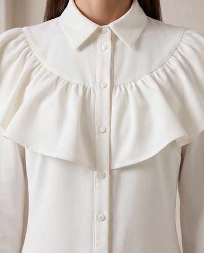 White ruffled shirt dress.